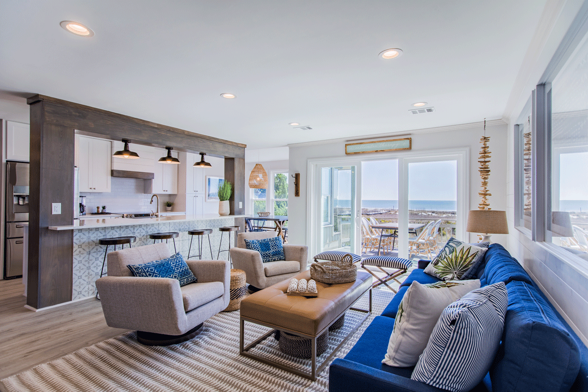 living room with mixed patterns in white and blue