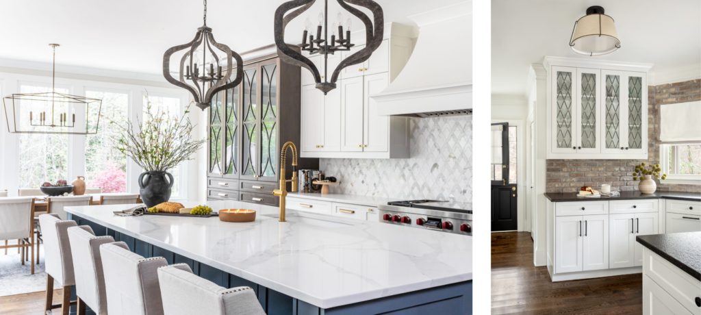 A spacious kitchen with a large marble-topped island, statement chandeliers, and white cabinetry, set against a backdrop of large windows and a dining area with a view of greenery. Another white kitchen with muntin windows and brick backsplash