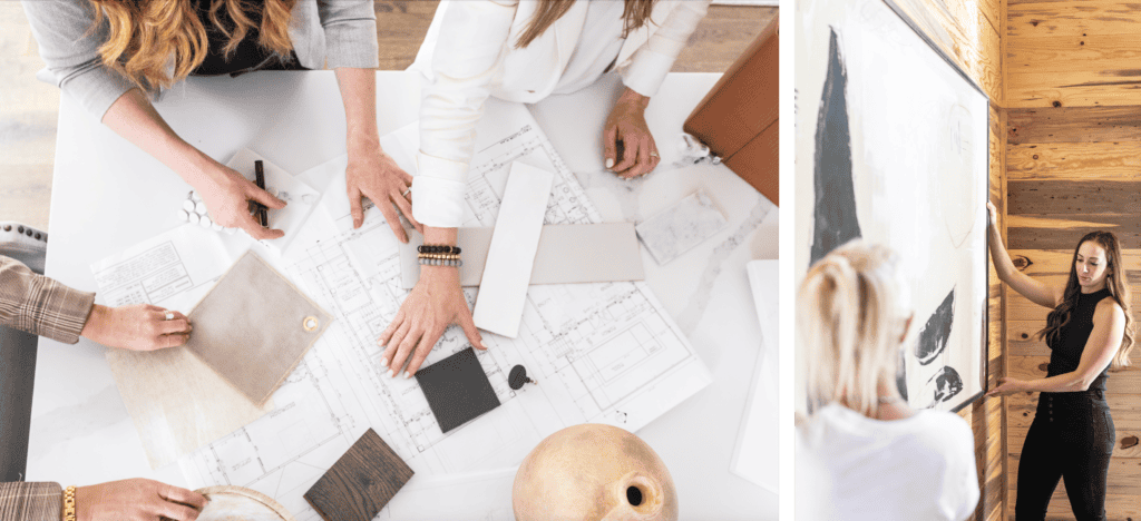 Designers standing around table, going over floor plans, fabrics, and tile/material choices. 